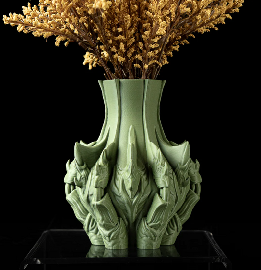 Jarrón de flores con garra